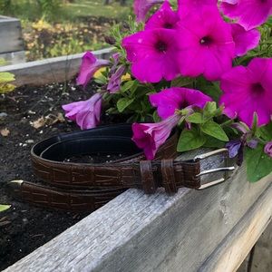 Brown leather belt with silver details